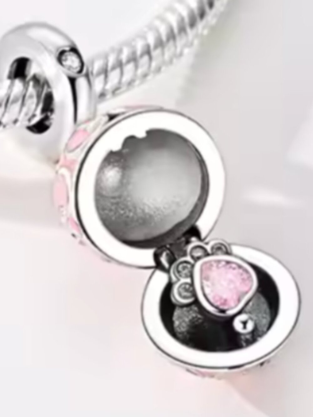 Sterling Silver Egg Locket w/Paw Print Inside